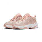 Emphasising the aggressive, chunky retro dad-shoe stance and the professional harmony of the monochromatic beige overlays against the wide, futuristic sole unit.