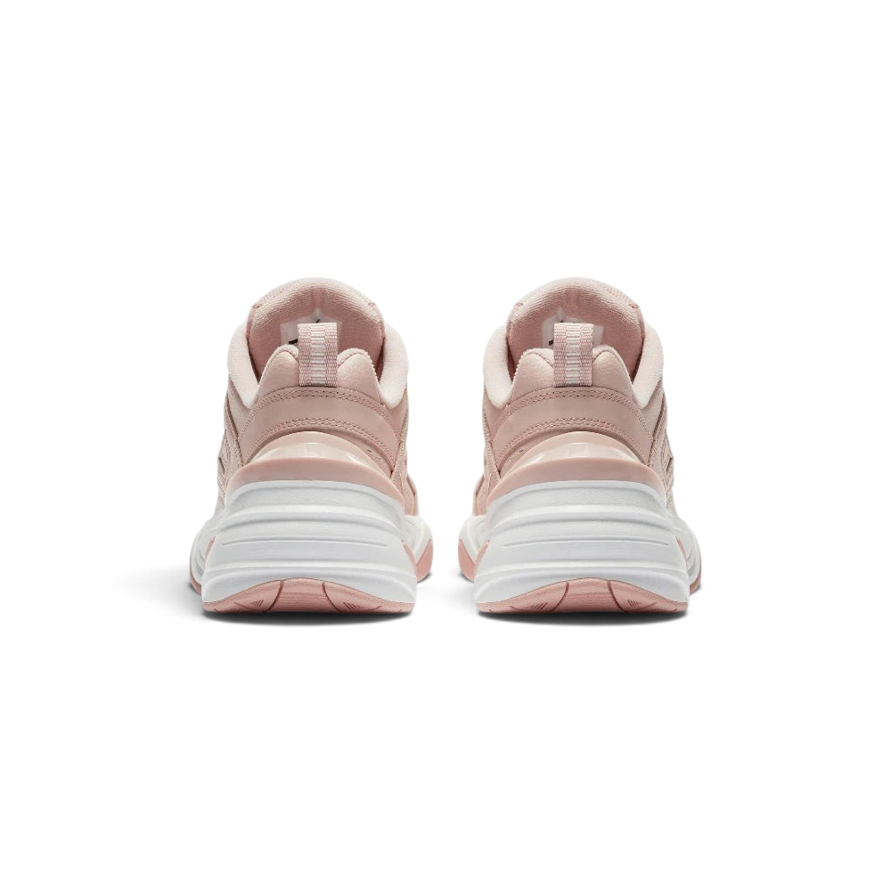 Focuses on the contoured shape of the padded collar, highlighting the sleek, distorted angles of the TPU heel clip sitting squarely below the webbed pull tab tracking down the rear spine.