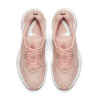 Focuses on the locked-in traditional lacing layout, displaying the perfect symmetry of the beige textile tongue, the debossed branding accents, and the clean stitching lines tracking down the leather front toe box area.