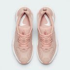 Focuses on the locked-in traditional lacing layout, displaying the perfect symmetry of the beige textile tongue, the debossed branding accents, and the clean stitching lines tracking down the leather front toe box area.