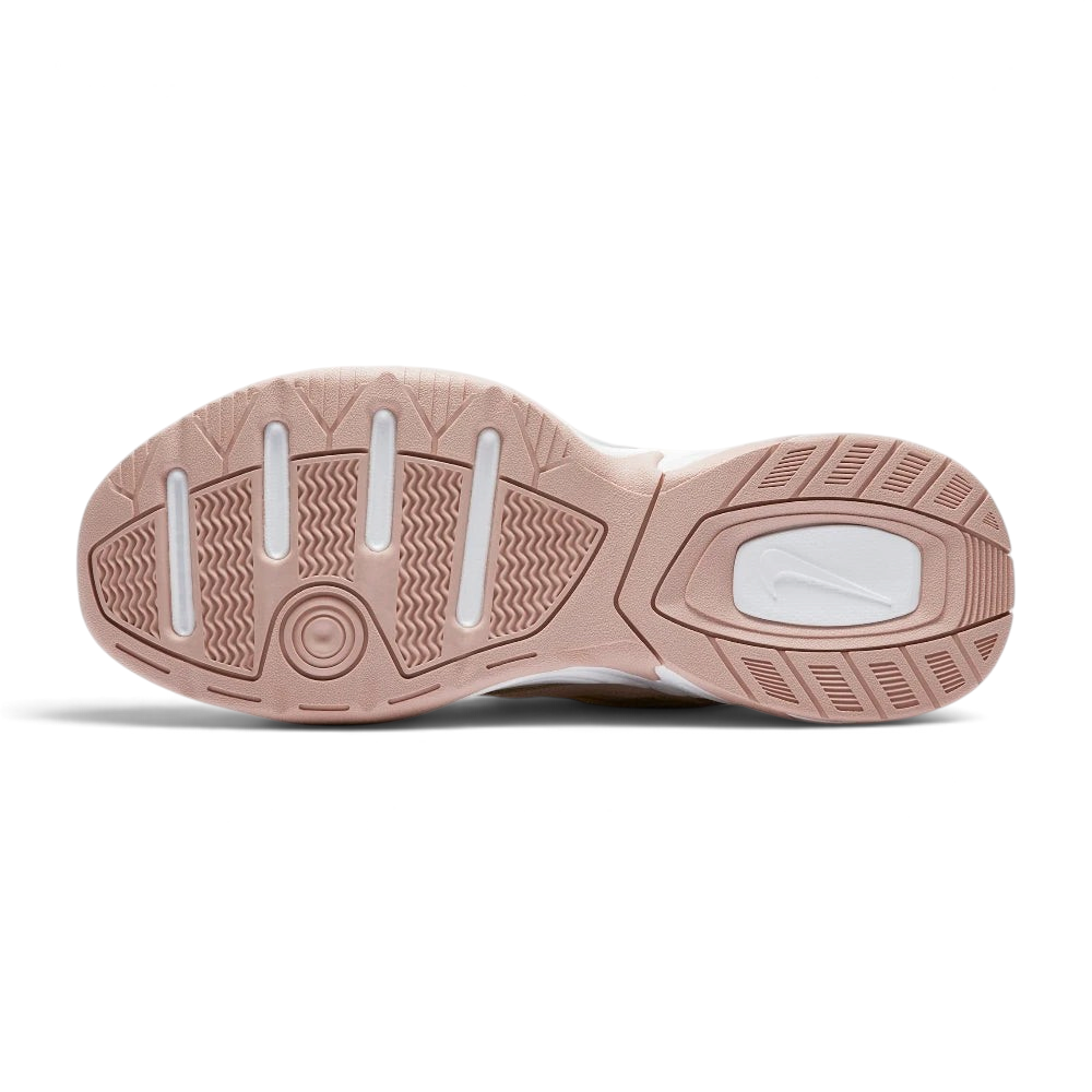 Displays the robust geometric traction pattern of the solid tan rubber sole, highlighting the wide platform footprint engineered for unreal everyday multi-surface street grip.