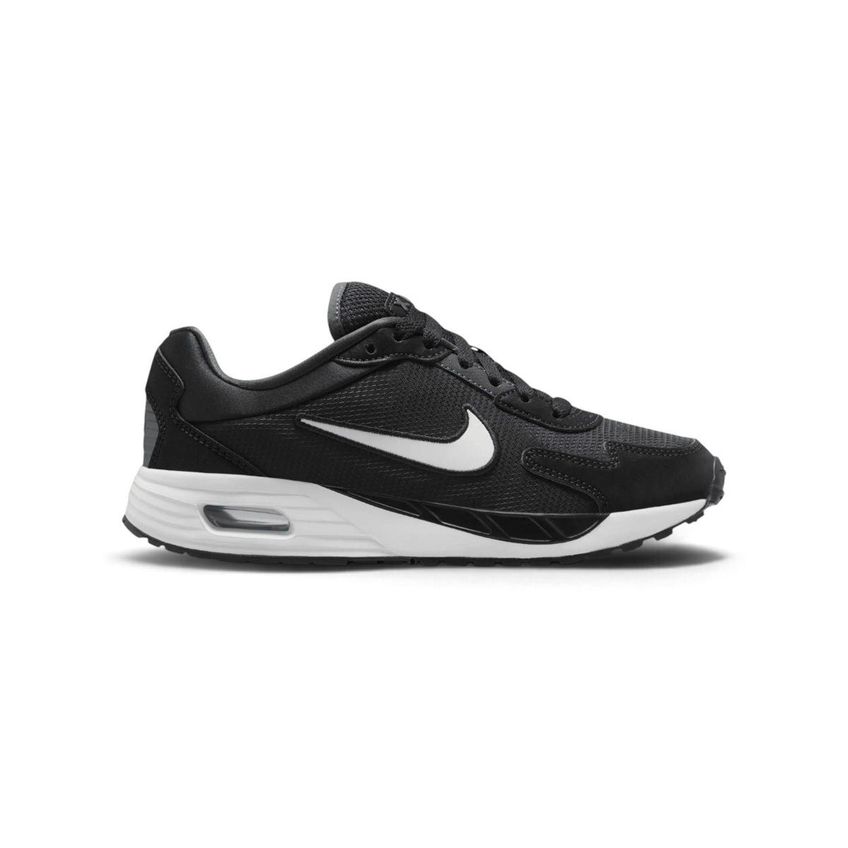 Displays the full lateral silhouette featuring the breathable black mesh upper, supportive synthetic leather mudguard overlays, the striking white side Swoosh, the thick white foam midsole, and the visible heel Air window. Main image