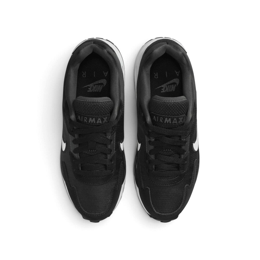 Direct overhead view of both shoes laid flat, showcasing the breathable forefoot mesh, flat black laces threaded through clean eyelets, padded black tongues bearing "AIR MAX" script, and cushioned interior footbeds.