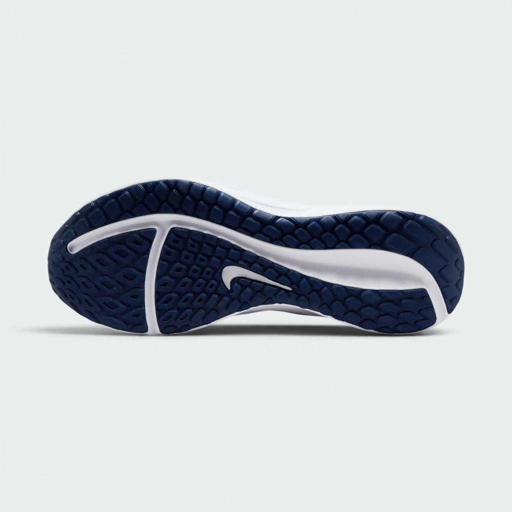 Displays the durable geometric tread pattern of the hard-wearing rubber sole, engineered for unreal everyday road grip and smooth heel-to-toe transitions.