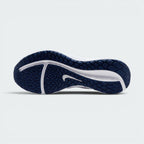Displays the durable geometric tread pattern of the hard-wearing rubber sole, engineered for unreal everyday road grip and smooth heel-to-toe transitions.