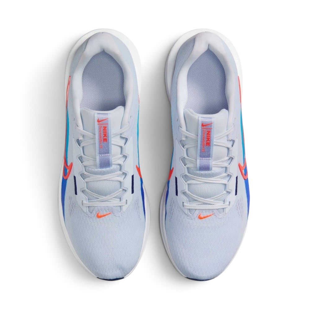 Focuses on the locked-in traditional lacing layout, displaying the perfect symmetry of the Deep Night textile tongue, the branded logo label, and the breathable mesh guarding the front toe box area.