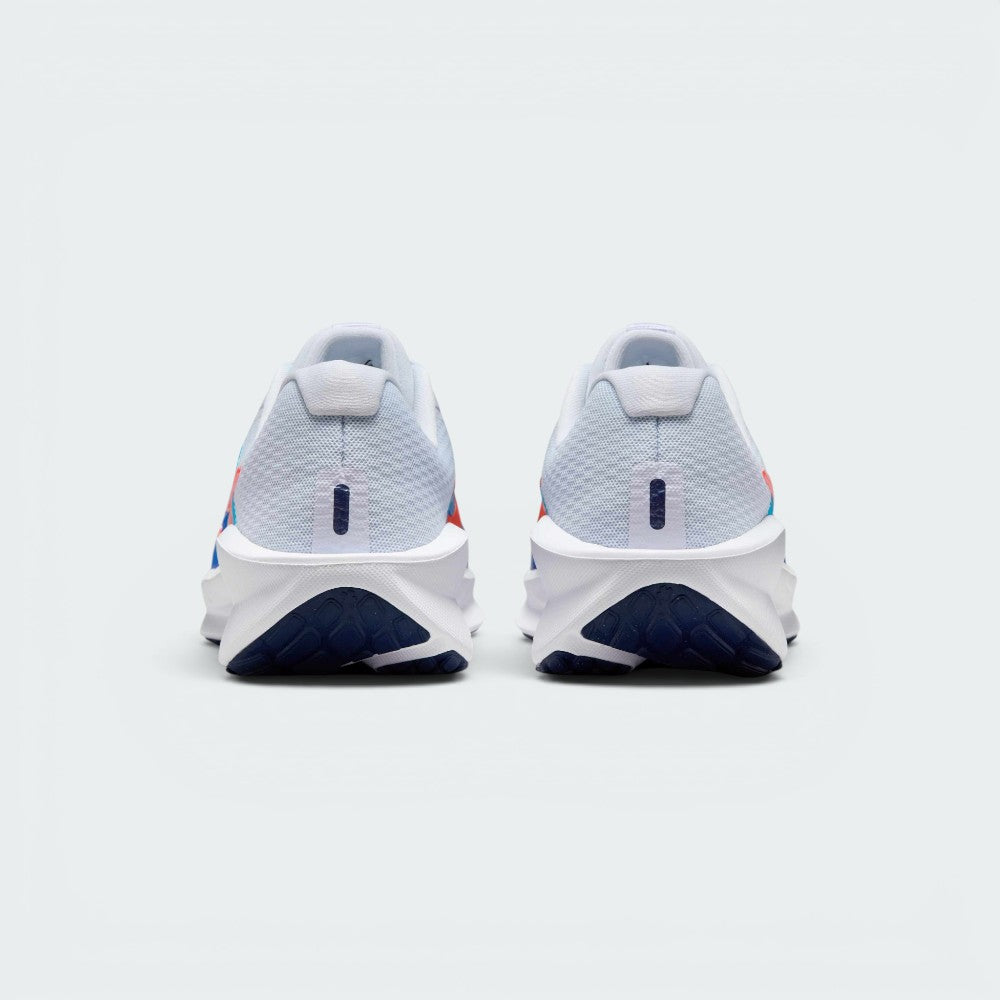 Focuses on the contoured shape of the padded ankle collar, highlighting the clean structural sweep of the rear foam wedge and the Bright Crimson inner fabric lining peaking over the rim.