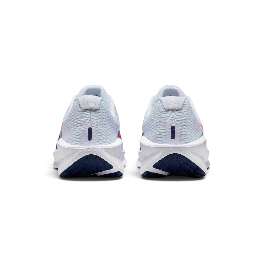 Focuses on the contoured shape of the padded ankle collar, highlighting the clean structural sweep of the rear foam wedge and the Bright Crimson inner fabric lining peaking over the rim.