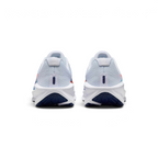 Focuses on the contoured shape of the padded ankle collar, highlighting the clean structural sweep of the rear foam wedge and the Bright Crimson inner fabric lining peaking over the rim.