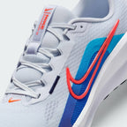 Details the premium stitching wrapping the front toe cap protection matrix and the precision eyelet lacing lines tracking.