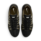 Focuses on the locked-in toggle lacing layout, displaying the flecked speed laces with cinch lock, central "BOWERMAN SERIES" ribbon, black mesh tongues, and khaki-lined interior footbeds with white Swoosh logos.