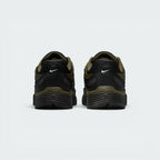 Focuses on the rear profile, highlighting the black synthetic heel counters with white micro-Swoosh logos, Cargo Khaki frame, and the wide black foam midsole base.