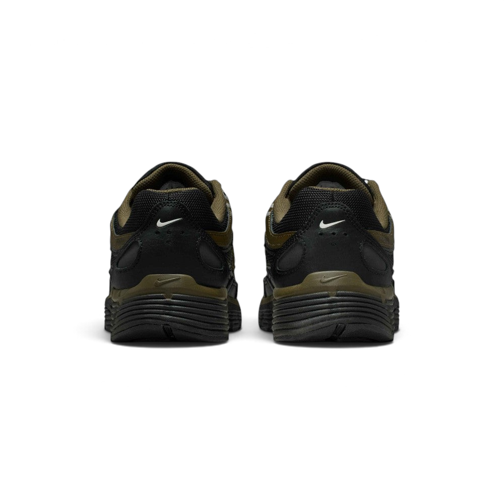 Focuses on the rear profile, highlighting the black synthetic heel counters with white micro-Swoosh logos, Cargo Khaki frame, and the wide black foam midsole base.