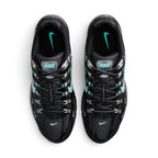 Highlighting the symmetrical central lacing throat, flat black laces, "Bowerman Series" branded tongue webbing, padded collar lining, and cushioned dark sockliner with hyper turquoise branding, demonstrating the upper template constructed for a comfortable "locked-in" fit.