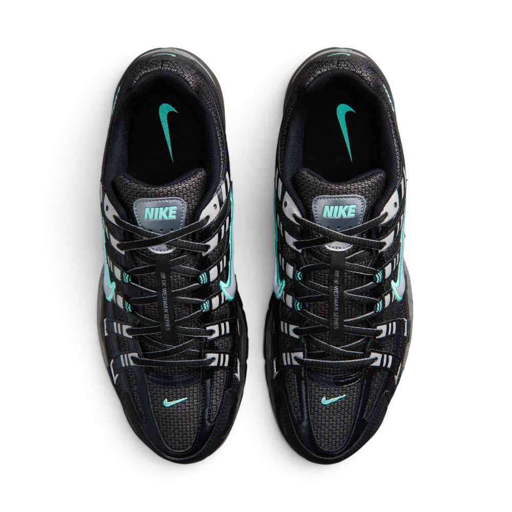 Highlighting the symmetrical central lacing throat, flat black laces, "Bowerman Series" branded tongue webbing, padded collar lining, and cushioned dark sockliner with hyper turquoise branding, demonstrating the upper template constructed for a comfortable "locked-in" fit.
