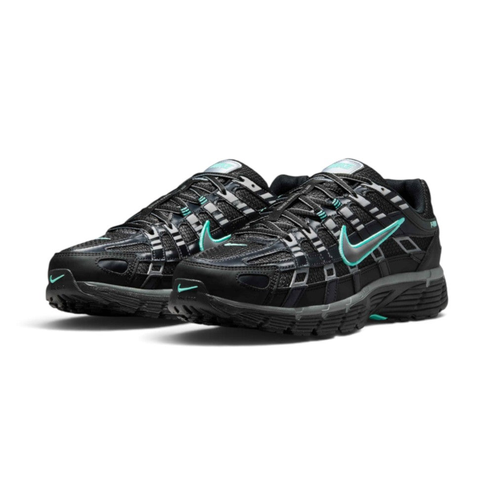Showcasing the "unreal" clean lines, layered black-to-metallic-grey depth, and electric hyper turquoise highlights across the distinct 2006 Pegasus-inspired sidewall cages from a 45-degree perspective.