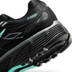 Highlighting the Sculpted Dual-Tone Foam Midsole Texture, Moulded Swoosh with Heavy-Density Hyper Turquoise Stitching, and Multi-Directional Rubber Tread, demonstrating the impact-absorbing foam depth and retro-tested tooling.
