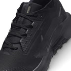 Macro focus on the forefoot and eyestay zone, detailing the fine GORE-TEX Invisible Fit mesh weave, water-repellent coating, and secure lace anchor loops.