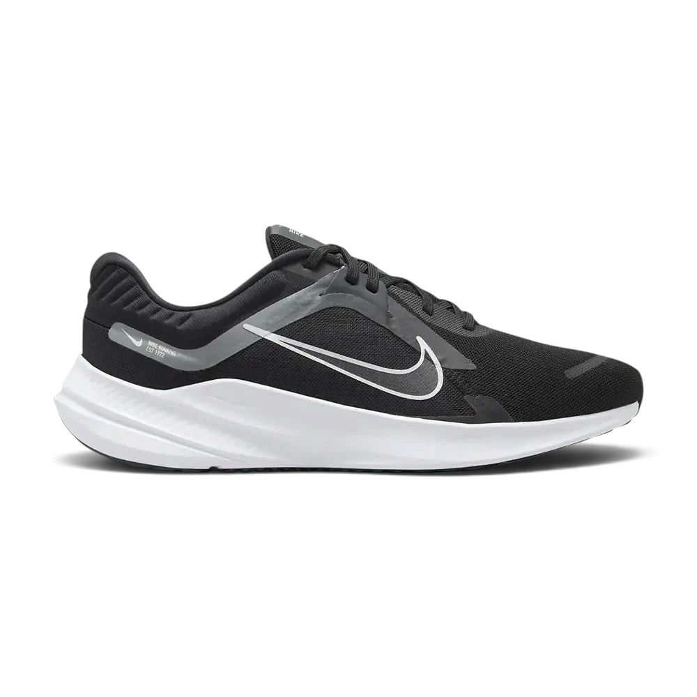 Highlights the high-velocity white Nike Swoosh slashing across the professional depth of the black engineered mesh upper and the contoured midsole wall.