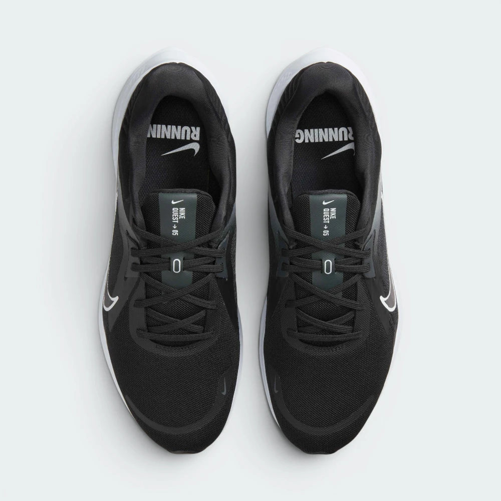 Focuses on the locked-in lace configuration, the integrated Flywire cabling channels, and the breathable texture of the toe box.