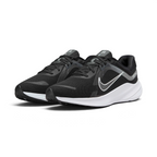 Emphasising the low-profile aerodynamic silhouette and the professional alignment of the Smoke Grey accent trims.