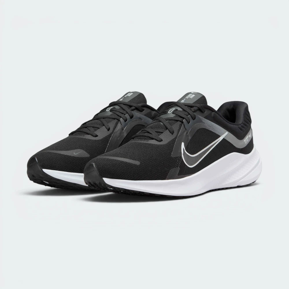 Emphasising the low-profile aerodynamic silhouette and the professional alignment of the Smoke Grey accent trims.