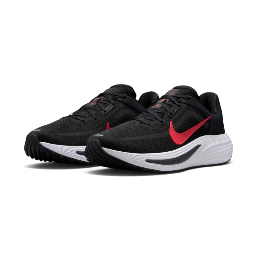 Three-quarter forward angle of the Nike Quest 7 trainers, showcasing their sleek athletic silhouette and bold black-and-red color blocking.