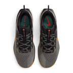Focuses on the locked-in central lacing layout, displaying flat laces, open-hole mesh tongues with Nike Trail branding badges, padded ankle collars, and cushioned insoles.