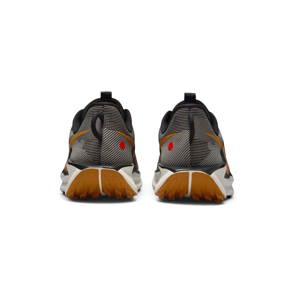 Focuses on the rear profile, displaying the structured heel counter, convenient webbing pull tab, and the wide flared footprint of the ReactX foam midsole base.
