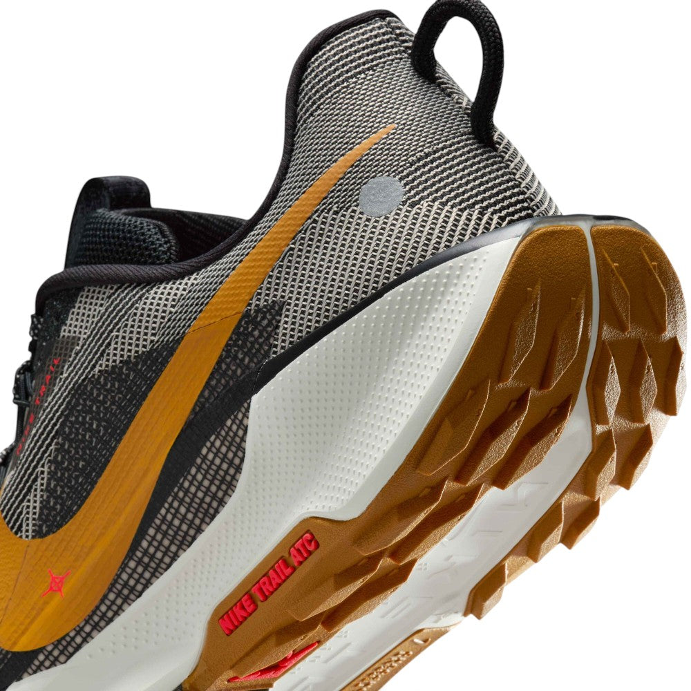 Highlights the "unreal" clean finish where the thick ReactX foam midsole meets the aggressive lugs of the Nike Trail All-Terrain Compound (ATC) rubber outsole.