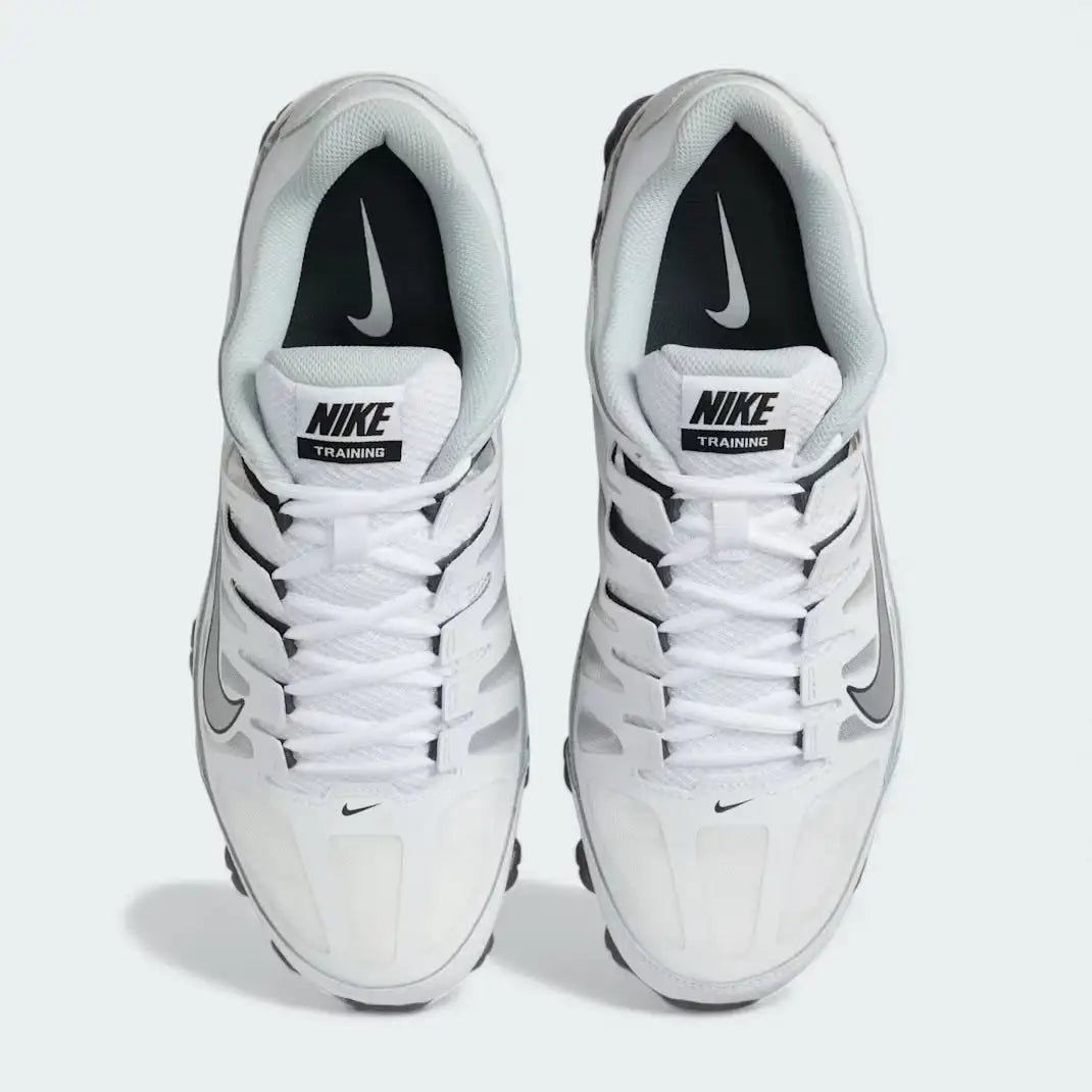 Top-down view of a pair of Nike Reax 8 Training Shoes Men's in white, highlighting their robust silhouette and lace-up closure.