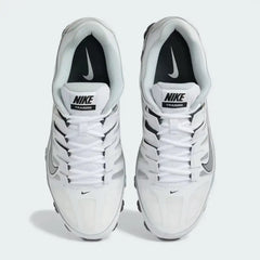 Top-down view of a pair of Nike Reax 8 Training Shoes Men's in white, highlighting their robust silhouette and lace-up closure.