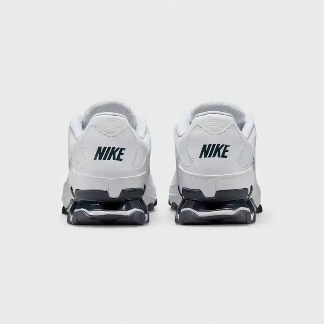 Rear view of the Nike Reax 8 Training Shoes Men's, focusing on the visible Reax cushioning system in the heel and supportive structure.