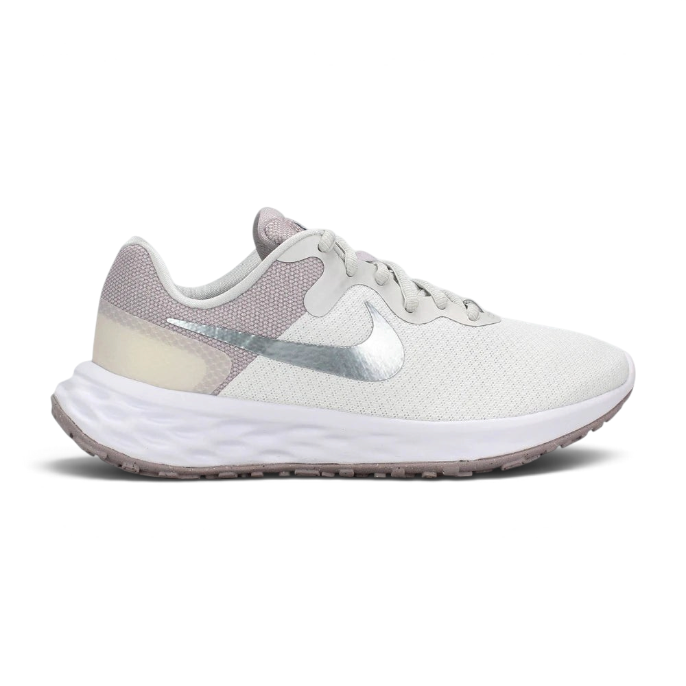 Highlights the high-velocity sweep of the metallic silver Nike Swoosh, showing the professional texture of the white mesh forefoot, the muted Ocean Cube blue-grey heel paneling, and the clean white foam midsole wall. Main image