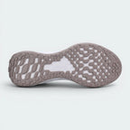 Displays the computer-generated tread pattern of the durable speckled rubber sole, showcasing the flexible lug matrix engineered for unreal everyday walking flexibility and grip.