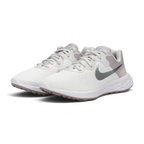 Emphasising the low-cut, athletic running stance of the trainers, highlighting the delicate color harmony of the white, silver, and soft ocean cube blue paneling.