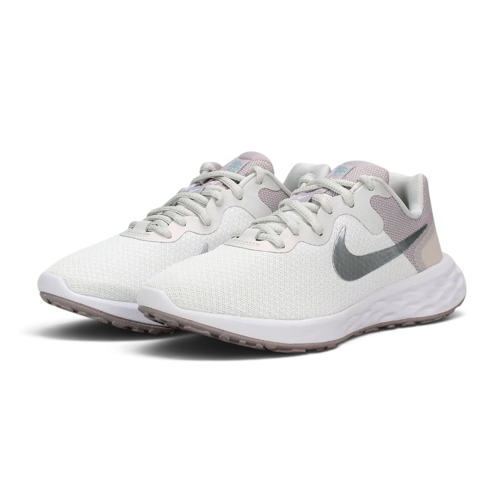 Emphasising the low-cut, athletic running stance of the trainers, highlighting the delicate color harmony of the white, silver, and soft ocean cube blue paneling.