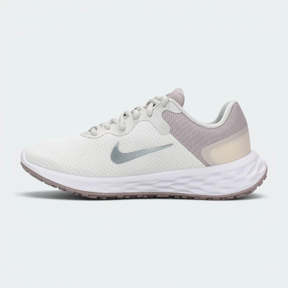 Highlights the subtle inner-side view of the shoe, displaying a smaller metallic silver Swoosh, the smooth transition between white and ocean cube mesh, and the clean white foam midsole base.