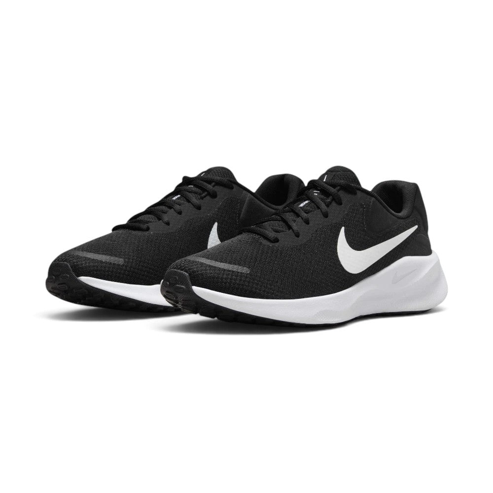 Emphasising the low-profile, modern athletic silhouette and the sharp monochrome contrast between the jet-black upper and crisp white foam midsole.