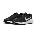Emphasising the low-profile, modern athletic silhouette and the sharp monochrome contrast between the jet-black upper and crisp white foam midsole.
