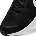 Details the micro-precision of the forefoot area, showing the open-weave black mesh toe box, bonded protective overlay strip, flat black laces, and wider toe profile.