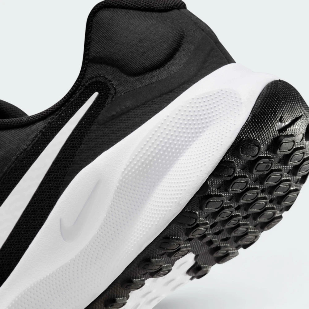 Highlights the "unreal" clean finish where the soft foam cushioning carrier meets the high-traction generative rubber lugs below.