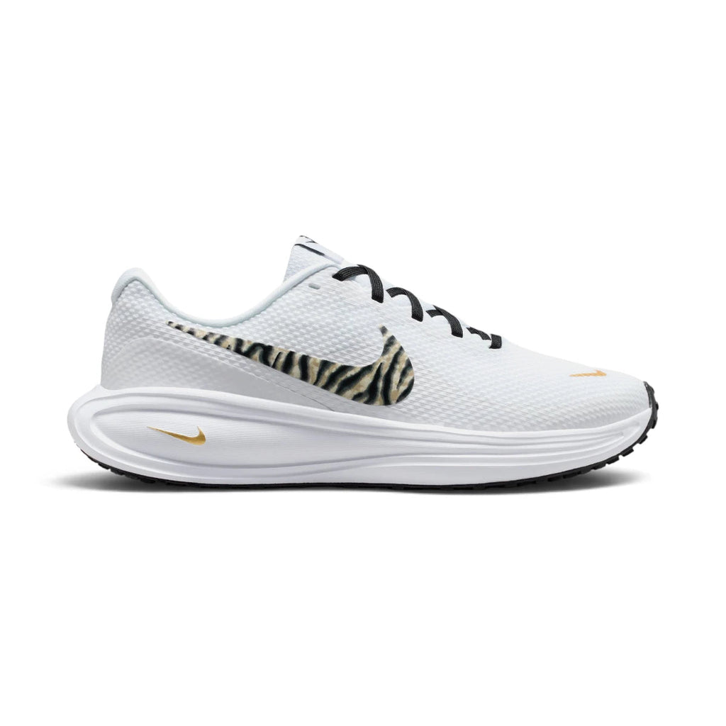 Side Profile Image: Studio lateral shot of the Nike Revolution 8 women's running shoes in white, black, and metallic gold, highlighting the breathable mesh upper, animal-print Swoosh, white foam midsole, and black rubber outsole.   