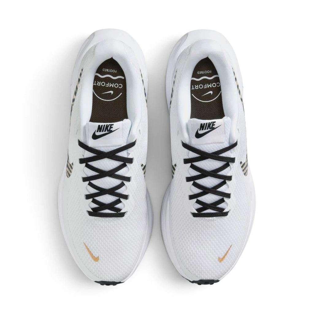 Top-Down View of Pair: Overhead view looking down at the laced white running shoes, displaying the black flat laces, branded tongue labels, and the comfort footbed detailing.   