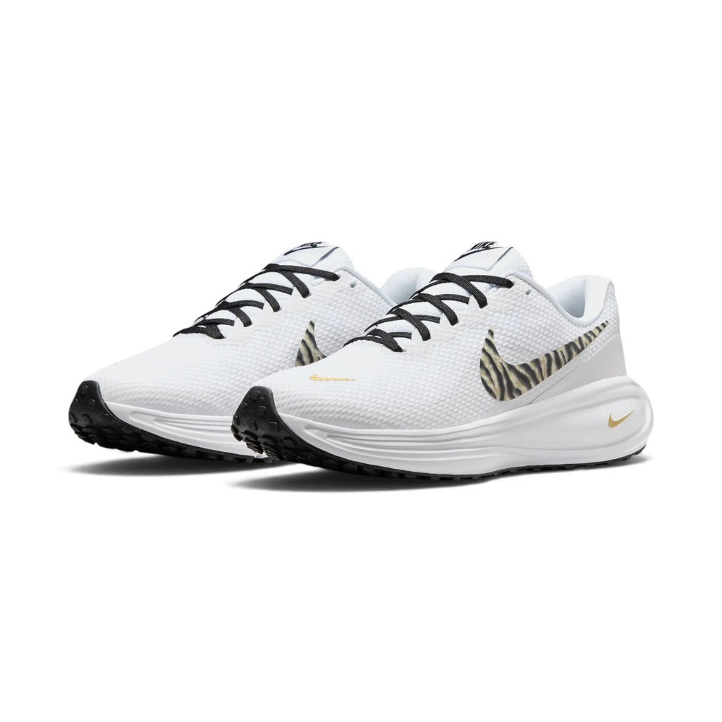 Angle View Showing Details Side by Side: Angled front-three-quarter perspective capturing the reinforced toe cap, mesh texture, animal-print side swoosh, and gold mini-swoosh branding.   