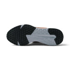 Bottom profile of the running shoe displaying the black-and-grey multi-surface rubber traction pattern and integrated grip pods.