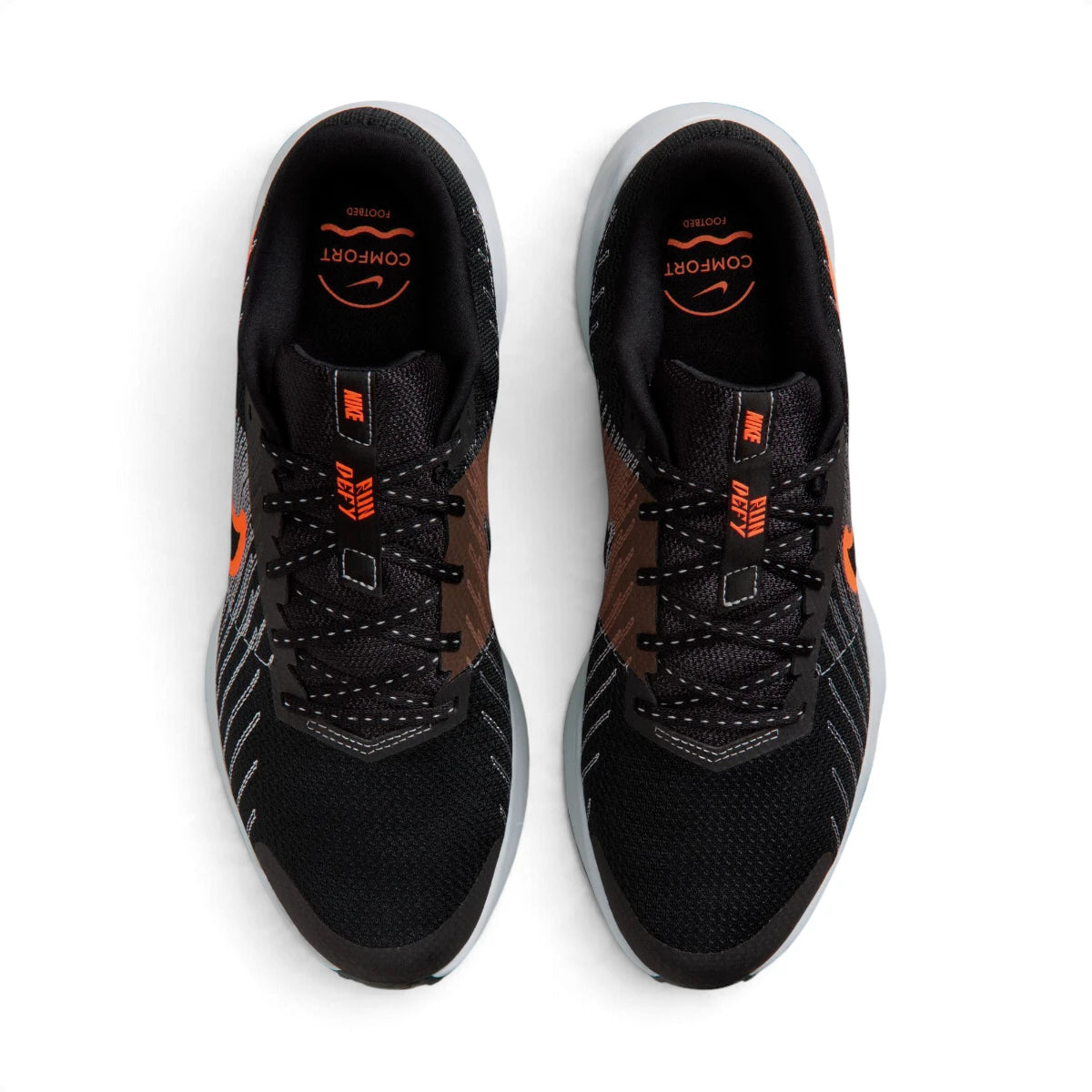 Overhead view of both running shoes showing the breathable black mesh forefeet, central lacing systems, and branded insoles featuring "COMFORT" footbed text.