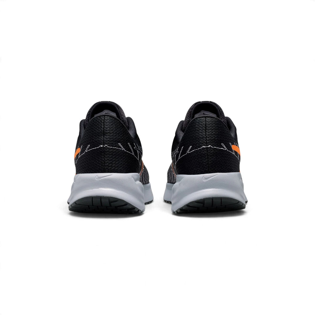 Rear view of the sneakers emphasising the supportive heel counters, subtle contrast stitching details, and the curved Wolf Grey sole geometry.