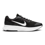 Highlights the athletic lateral profile showing the breathable Black mesh upper, contrasting White Nike Swoosh, Dark Smoke Grey overlay accents, sculpted thick white foam midsole, and black rubber outsole tread.