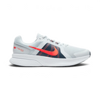 Highlights the high-velocity sweep of the contrasting Chile Red Nike Swoosh, showing the professional, multi-textured grey mesh upper, the Obsidian navy midfoot paneling, and the clean white foam midsole wall.